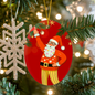 Retro Christmas ornament hanging on tree branch