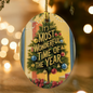 Elegant Christmas ornament featuring classic holiday typography