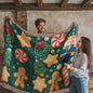 Holiday décor blanket featuring nutcrackers and ornaments