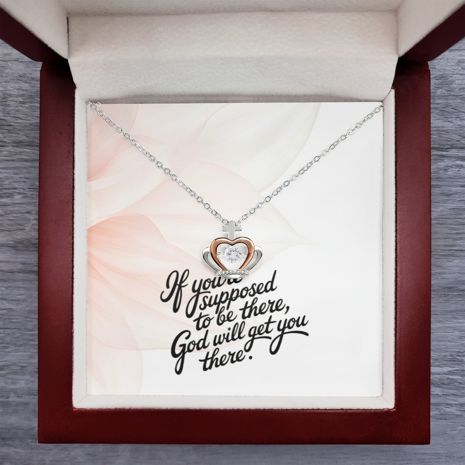 Close-up of crown pendant with dancing cubic zirconia center