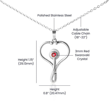 Inspirational stethoscope necklace displayed on woman in scrubs, symbolizing strength and compassion.