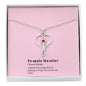 Female Hustler stethoscope necklace with heart-shaped pendant and red Swarovski crystal.
