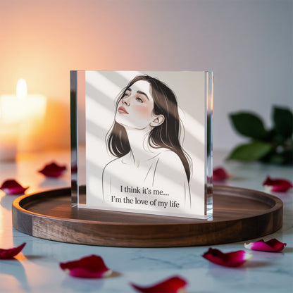 Close-up of minimalist line art and soft tones on acrylic block