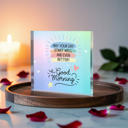 Close-up of clear acrylic quote plaque reflecting light beautifully