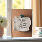 Close-up of printed quote on crystal-clear acrylic material