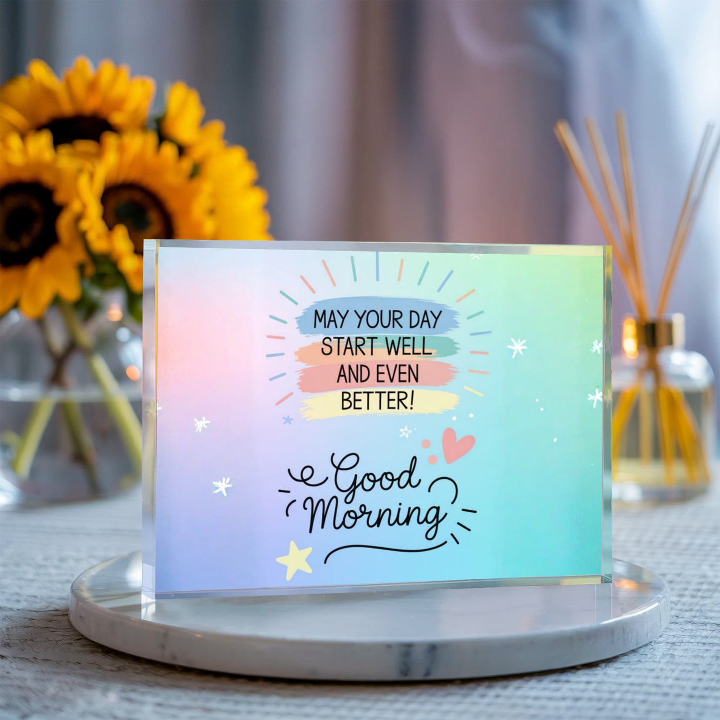 Lifestyle photo of acrylic block on bedside table with morning sunlight