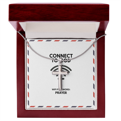 Close-up of stainless steel cross pendant with polished finish