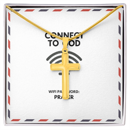 Polished cross necklace reflecting light on neutral background