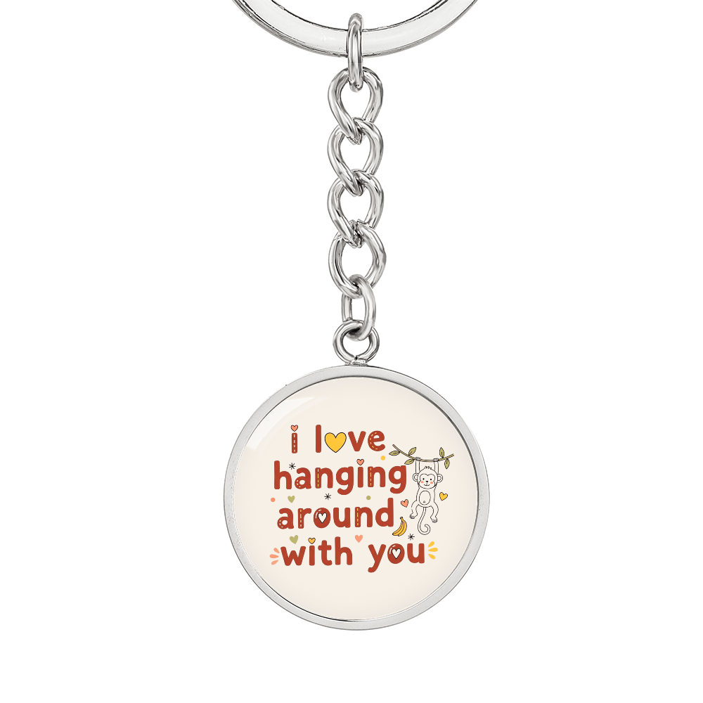 Close-up of monkey illustration on circle pendant