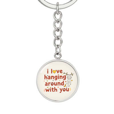Close-up of monkey illustration on circle pendant