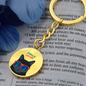 Cute holiday cat keychain with red and green details