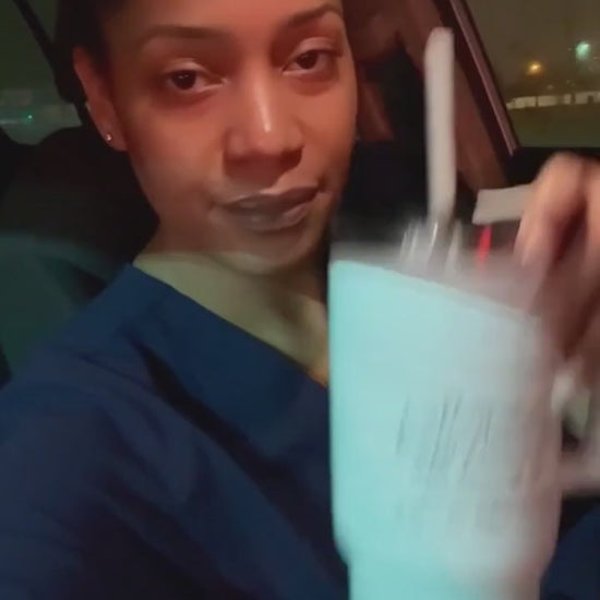 nurse holding tumbler during shift
