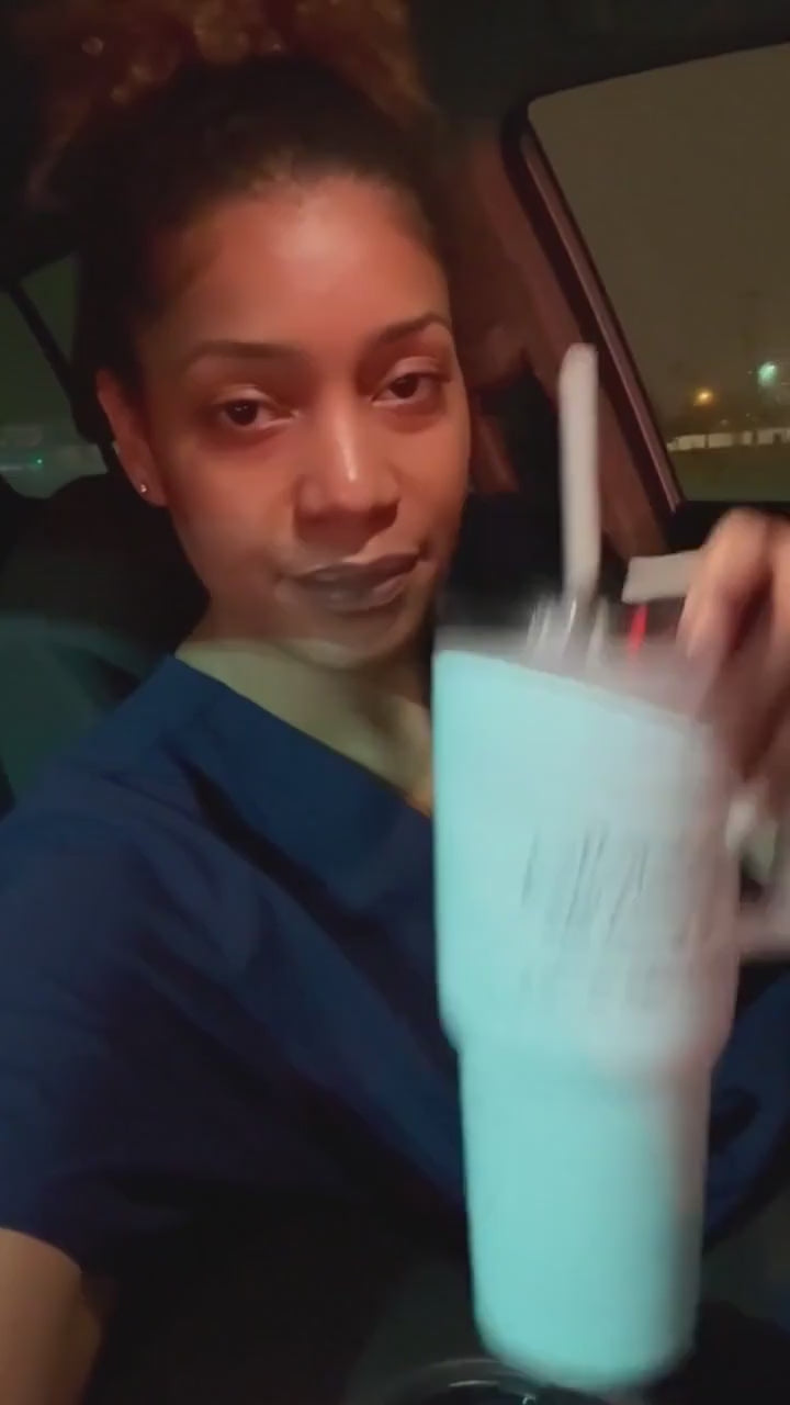nurse holding tumbler during shift