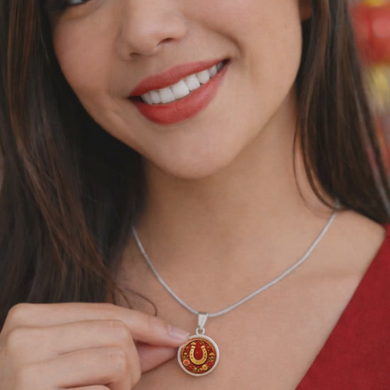 I want a lucky charm necklace for prosperity.